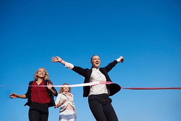 Image showing business people running on racing track