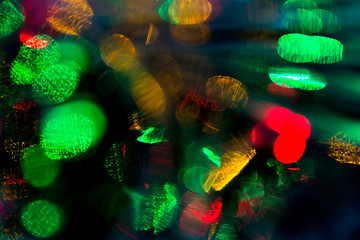 Image showing colorful night lights bokeh over dark background