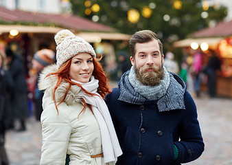 Image showing happy couple walking in old town