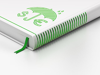 Image showing Security concept: closed book, Money And Umbrella on white background