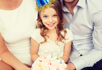 Image showing family with cake and candles