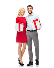 Image showing happy couple with gift boxes