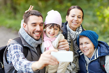 Image showing family taking selfie with smartphone in woods