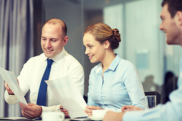 Image showing business people with papers meeting in office