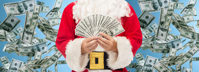 Image showing close up of santa claus with dollar money