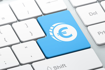 Image showing Currency concept: Euro Coin on computer keyboard background