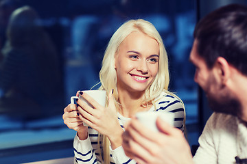 Image showing happy couple meeting and drinking tea or coffee