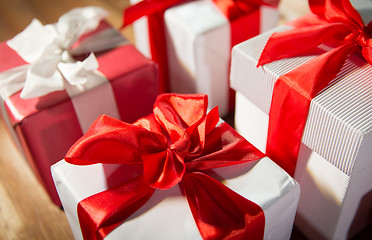 Image showing close up of gift boxes on wooden floor