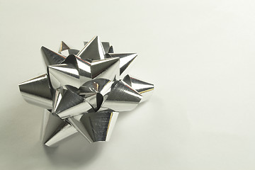 Image showing silver foil bow