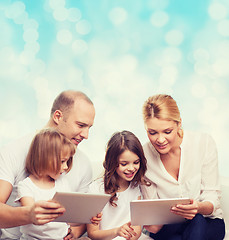 Image showing happy family with tablet pc computers