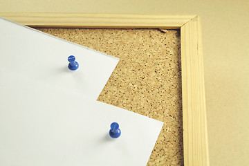 Image showing white notepaper on a cork board