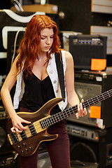 Image showing musician or customer with guitar at music store