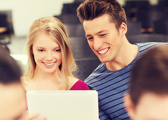 Image showing group of smiling students with tablet pc