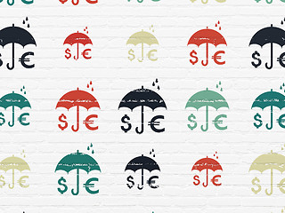 Image showing Protection concept: Money And Umbrella icons on wall background