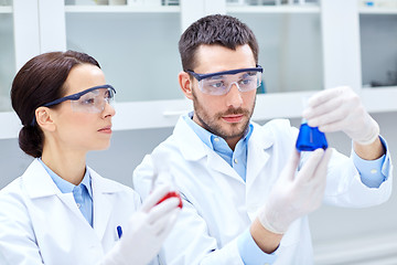 Image showing young scientists making test or research in lab