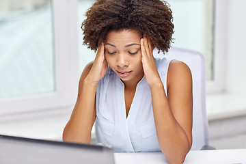 Image showing african woman with laptop at office