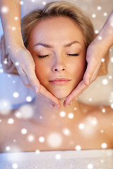 Image showing close up of woman having face massage in spa salon