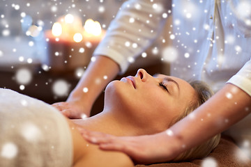 Image showing close up of woman lying and having massage in spa