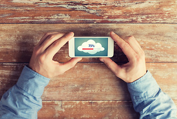 Image showing close up of hands with smartphone cloud computing