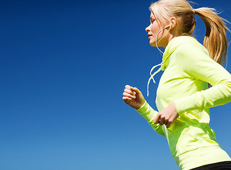 Image showing woman doing running outdoors