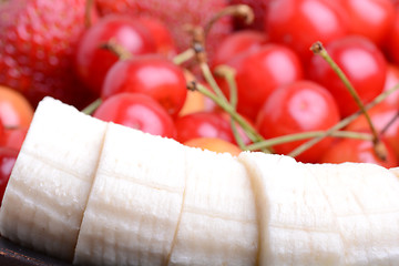 Image showing Composition with fruits cherry bananas strawberry