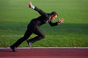 Image showing business man ready to sprint