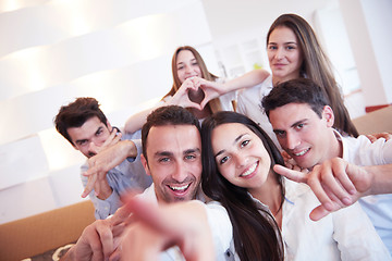 Image showing group of friends taking selfie