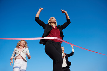 Image showing business people running on racing track