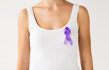 Image showing close up of woman with purple awareness ribbon