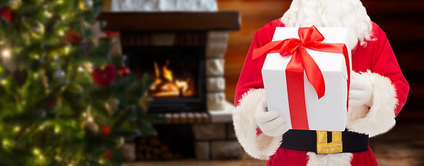 Image showing man in costume of santa claus with gift box