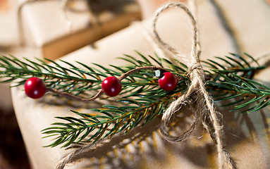Image showing close up of christmas gift with fir brunch