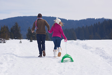 Image showing happy young couple having fun on fresh show on winter vacation