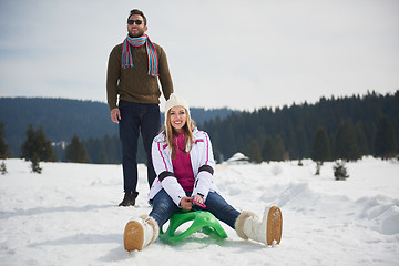 Image showing happy young couple having fun on fresh show on winter vacation