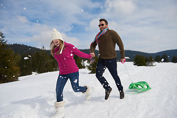 Image showing happy young couple having fun on fresh show on winter vacation