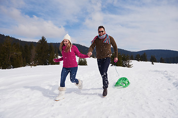 Image showing happy young couple having fun on fresh show on winter vacation