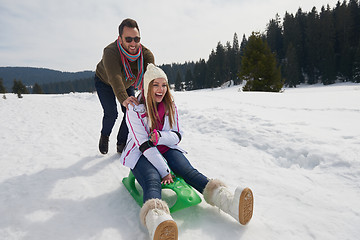 Image showing happy young couple having fun on fresh show on winter vacation