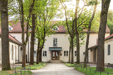 Image showing Traditional pastoral Catholic church backyard in European city