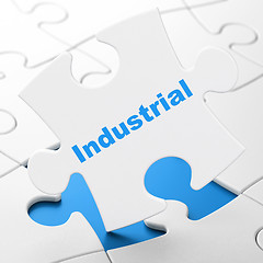 Image showing Manufacuring concept: Industrial on puzzle background