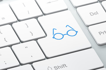 Image showing Learning concept: Glasses on computer keyboard background