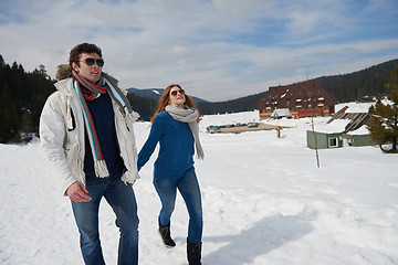 Image showing happy young couple having fun on fresh show on winter vacation