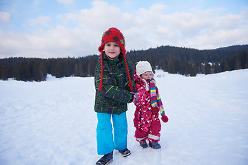 Image showing kids walking on snow