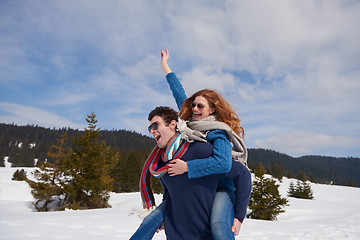 Image showing happy young couple having fun on fresh show on winter vacation