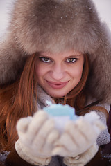 Image showing winter girl with gift