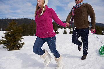 Image showing happy young couple having fun on fresh show on winter vacation