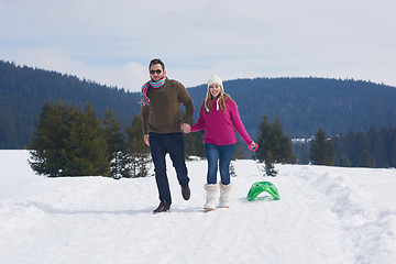 Image showing happy young couple having fun on fresh show on winter vacation