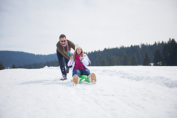 Image showing happy young couple having fun on fresh show on winter vacation