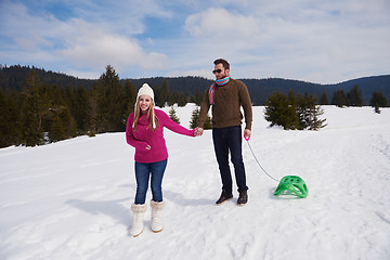 Image showing happy young couple having fun on fresh show on winter vacation