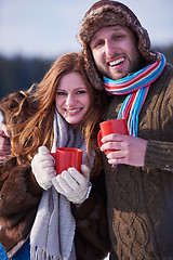 Image showing couple drink warm tea at winter