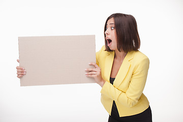 Image showing Businesswoman showing board or banner with copy space on white background 