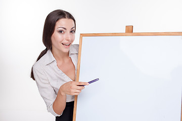 Image showing young business woman showing something on the white background